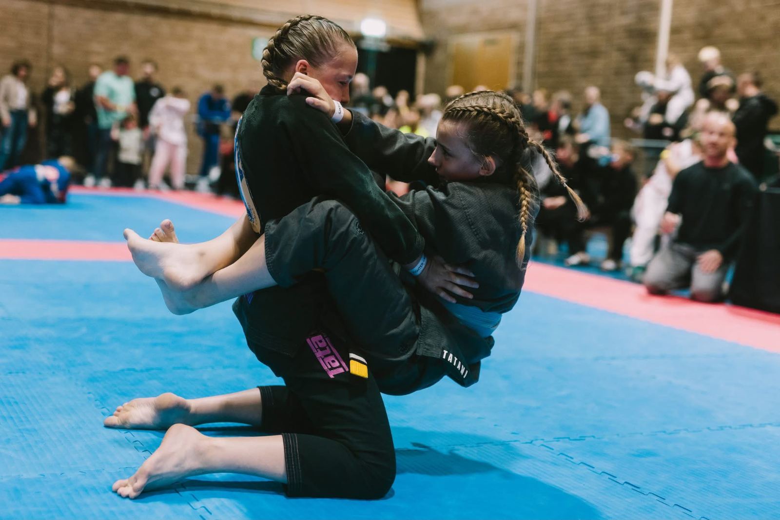 Junior competitors grappling