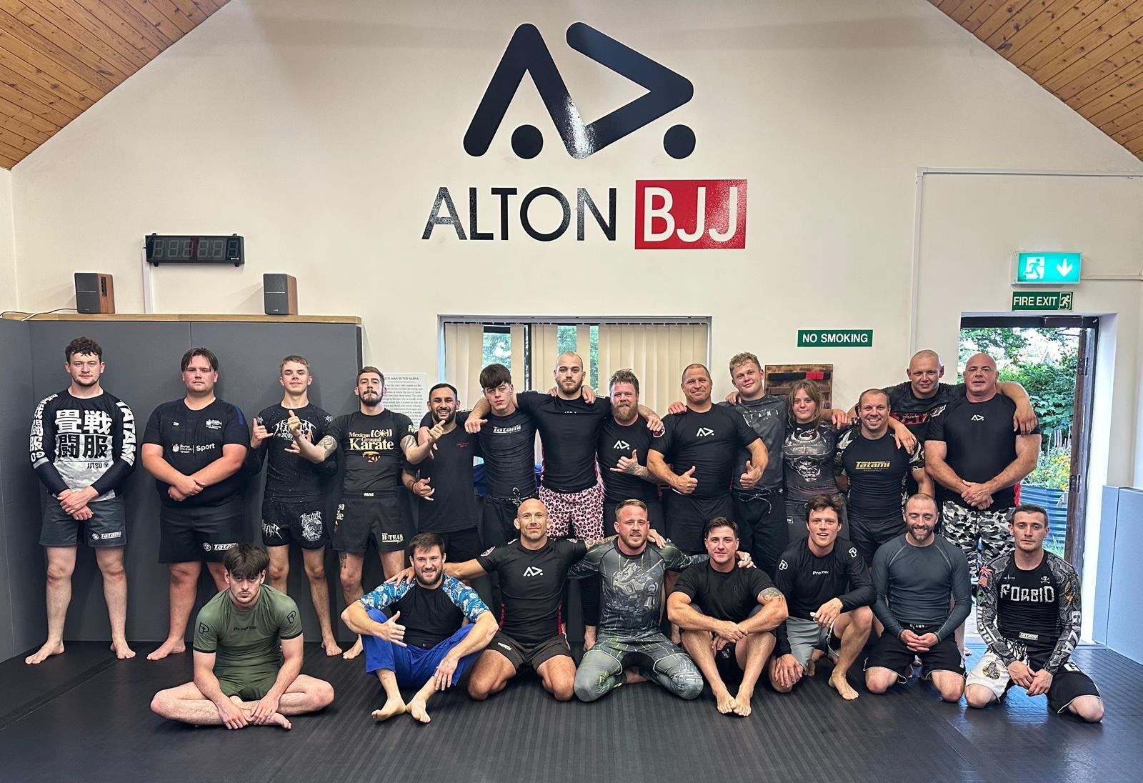 The Alton BJJ team under the club logo